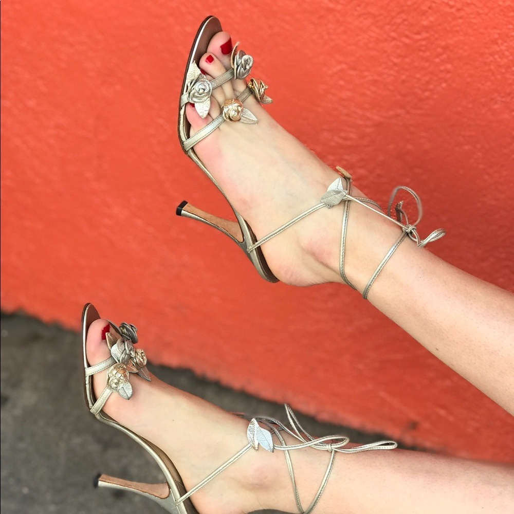 Manolo Blahnik gold sandals with rosette